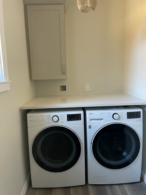 Custom New Build laundry room with LG front-load washer and dryer, quartz countertop, and upper cabinet — Bedford, NH