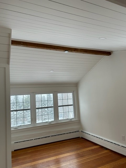 Partial Home Remodel vaulted attic room with white shiplap ceiling, single exposed beam, double windows, and pine hardwood floors — Meredith, NH