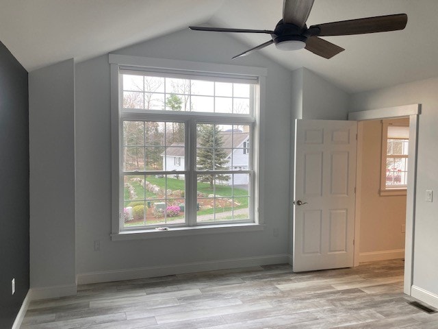 Wentworth New Build master bedroom with vaulted ceiling, large picture window, ceiling fan, and wide-plank floors — Governor's Crossing, NH